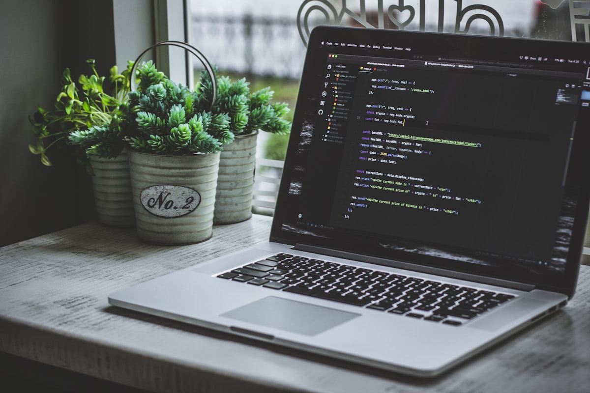 Web designer working on a multi-platform website layout